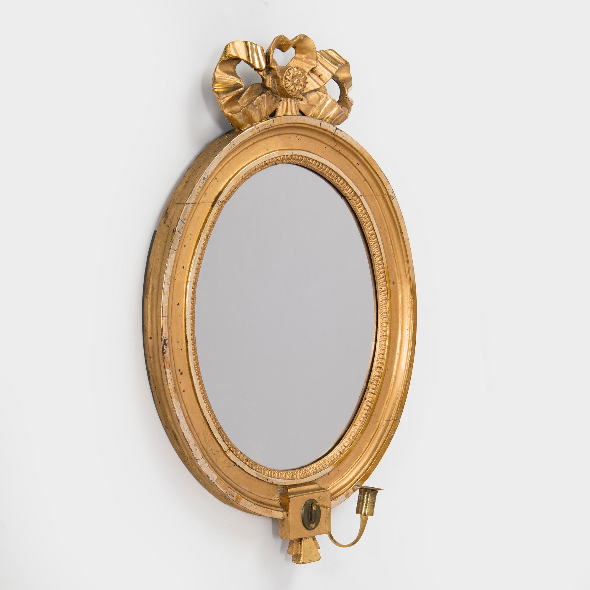 A Swedish Gustavian mirror wall lamp, late 18th century.