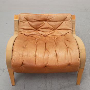 Bruno Mathsson, a "Pernilla" lounge chair with ottoman, DUX, Sweden, late 1900's.