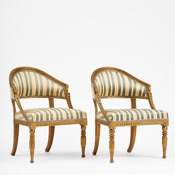 A pair of late Gustavian open armchairs attributed to E. Ståhl (master in Stockholm 1794-1820).