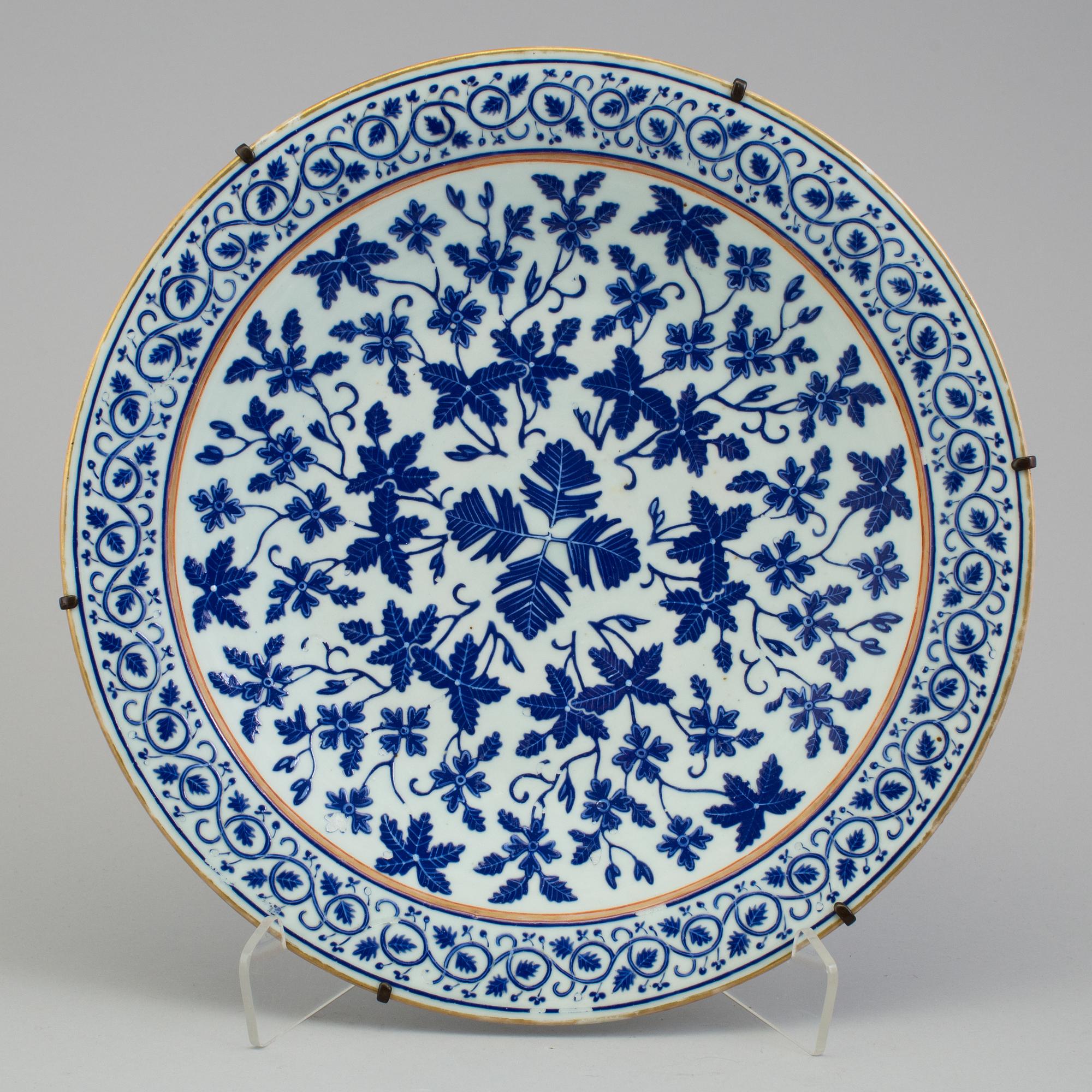 A Chinese blue and white porcelain charger, 20th century, with Guangxus six character mark.