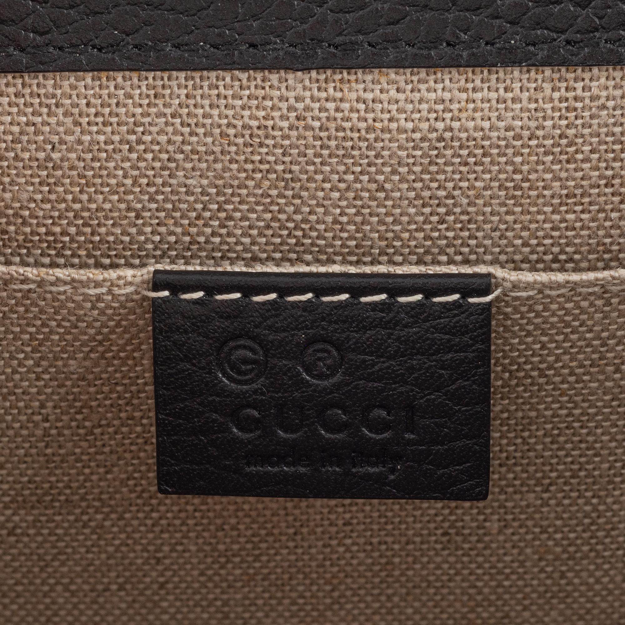 Gucci, a black leather 'Interlocking G' bag.