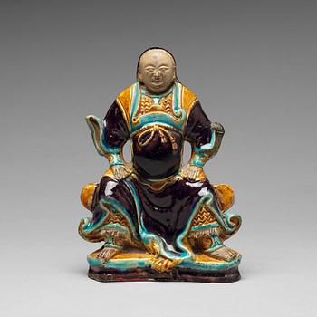 752. A ceramic figure of the warlord Guan Yu, Ming dynastin (1368-1644).