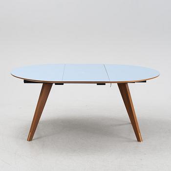 A 'New Mood' dining table by Michel H Nielsen for Bolia.