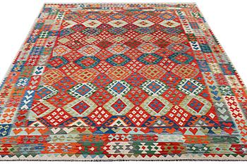 A Kilim carpet, c. 393 x 300 cm.