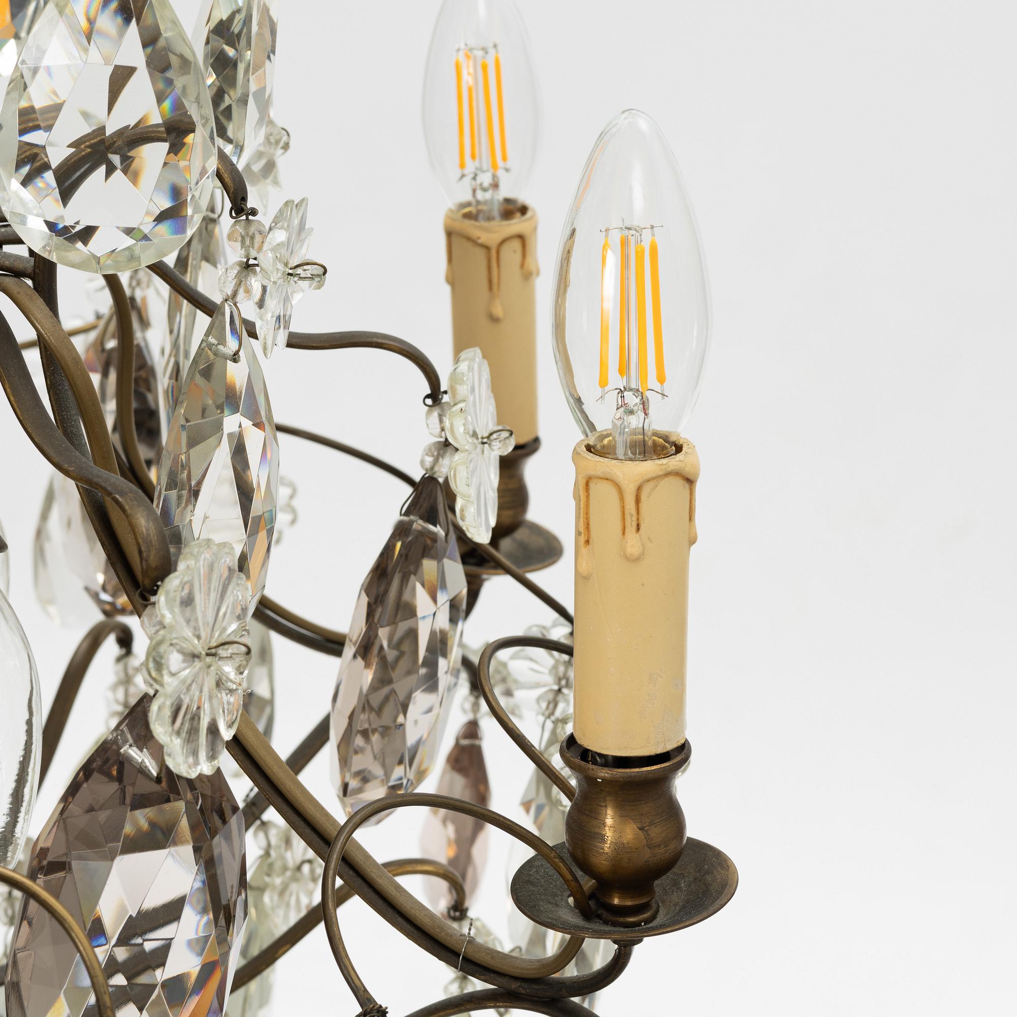 Takkrona, rokokostil, 1900-talets första hälft.