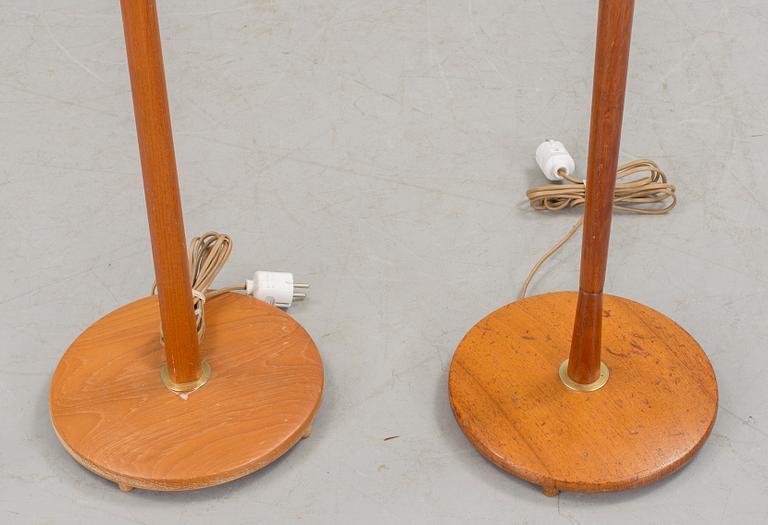Two floor lamps in teak and brass from the 1960s/70s.
