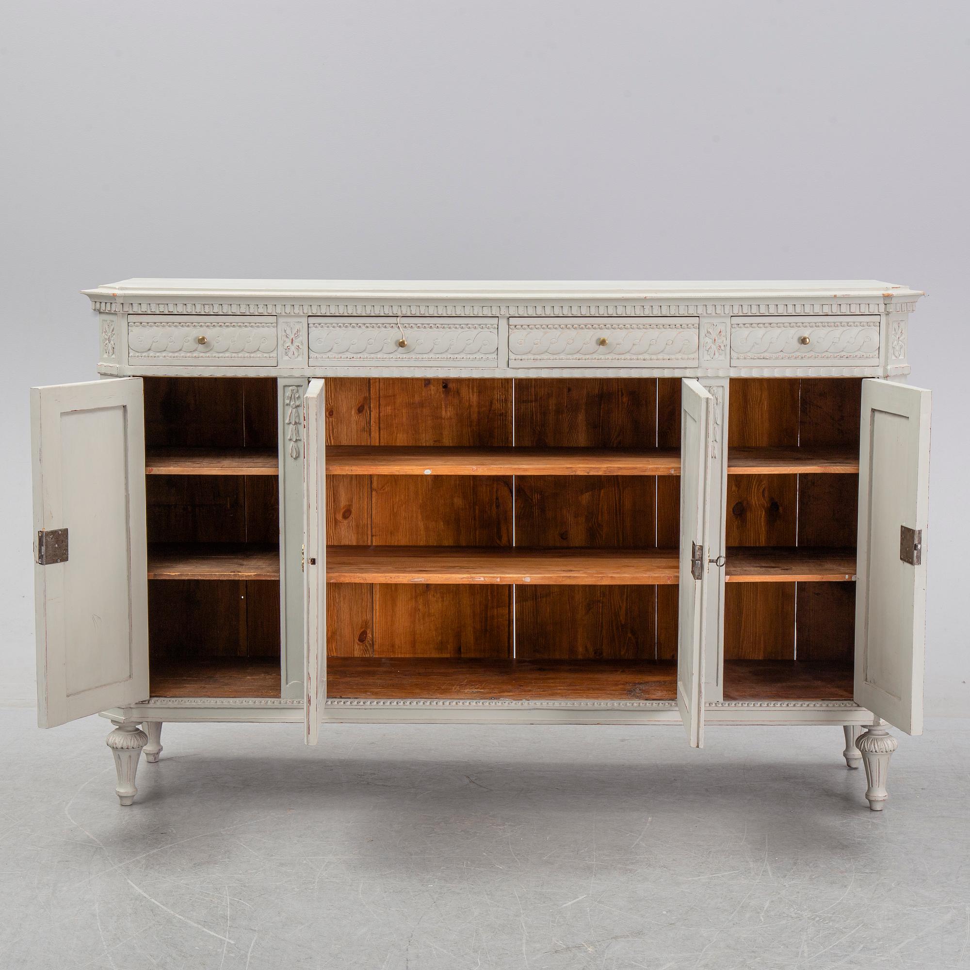 A painted Gustavian style cupboard, 19th Century.