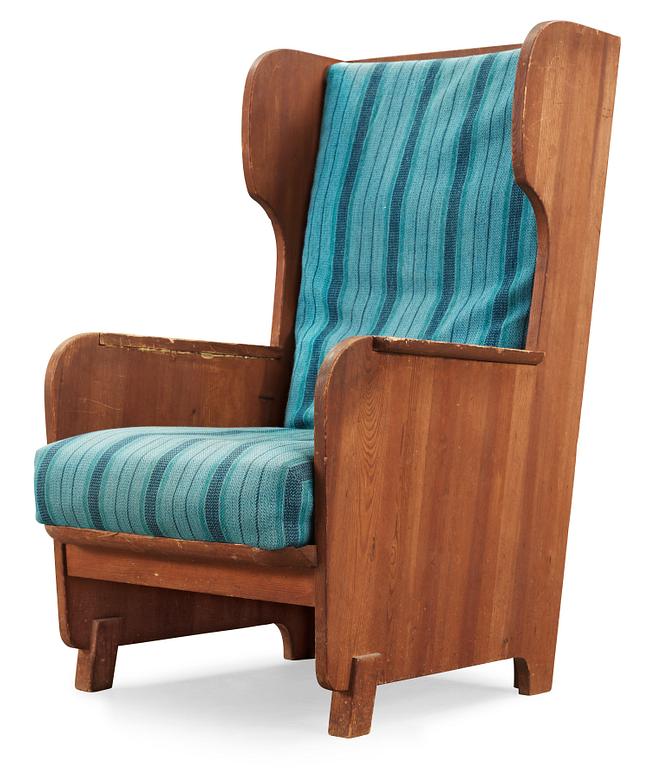 An Axel Einar Hjorth 'Lovö' stained pine armchair, Nordiska Kompaniet, Sweden 1930's.