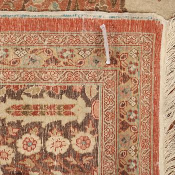 A CARPET. An antique Tabriz. 426 x 311 cm.