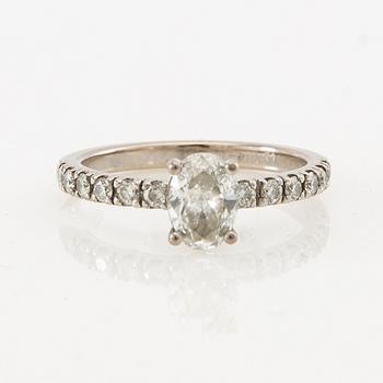 Ring, Patrik af Forselles, with an oval-cut diamond approximately 0.57 ct.