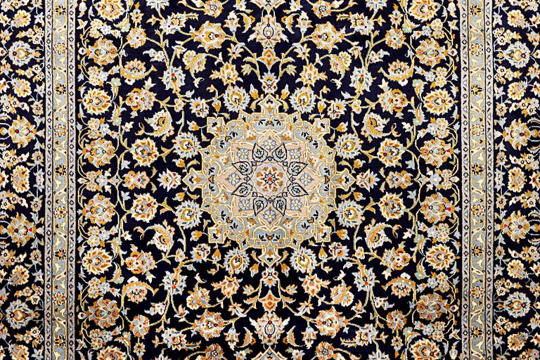 A Keshan carpet, c. 365 x 259 cm.