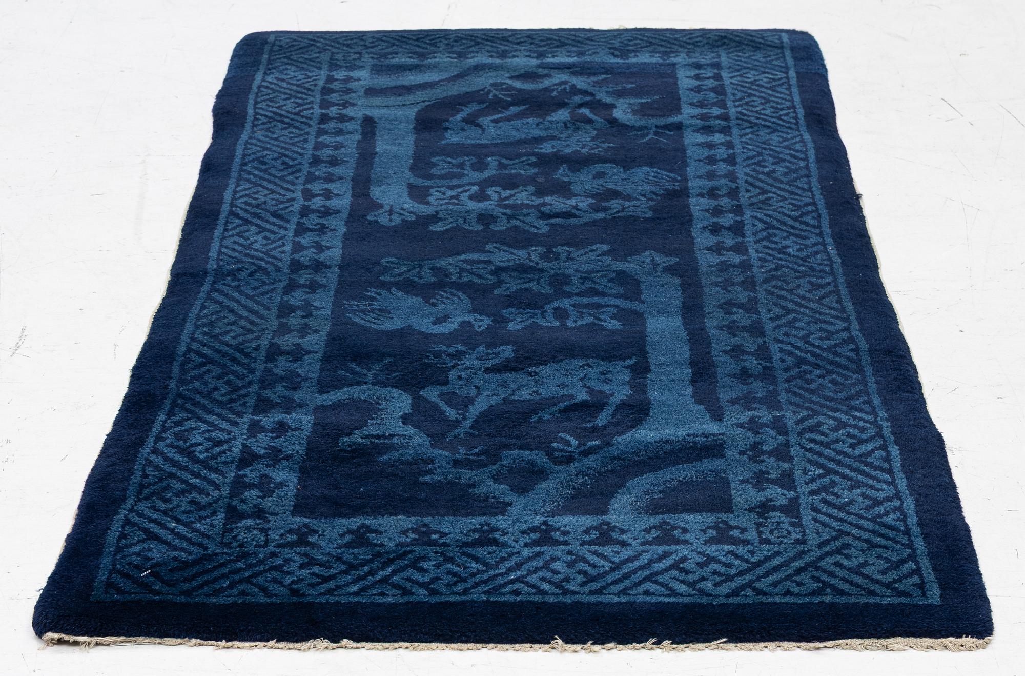 An antique Baotou rug, North China, c 157 x 75 cm.