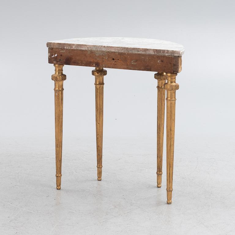 A Gustavian giltwood and white marble console table, Stockholm, late 18th century.