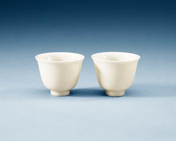 1666. A pair of blanc de chine wine cups, Qing dynasty, Kangxi (1662-1722).