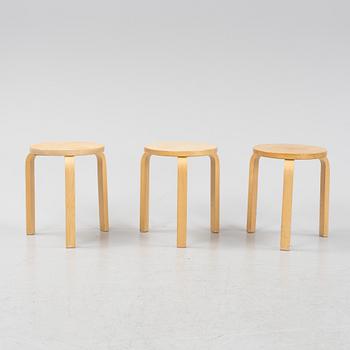 Alvar Aalto, three birch model 60 stools, Artek, Finland.