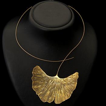 A MARIA JAUHIAINEN NECKLACE, "Ginkgo", stainless steel, 18K gold, 24K gold leaf.