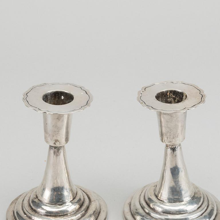 A PAIR OF SILVER CANDLESTICKS SOUTH AMERIKA.