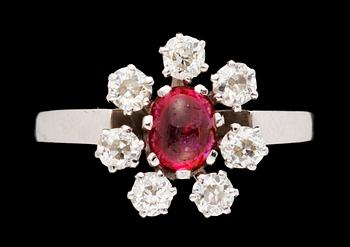 641. A gold diamond and ruby ring.