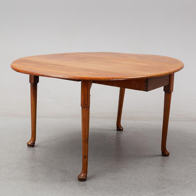 An end of the 19th Century mahogany drop leaf table.