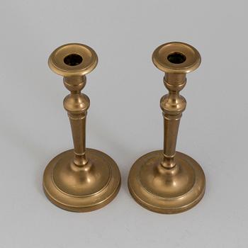 A PAIR OF BRONZE CANDLESSTICKS, 19th century.