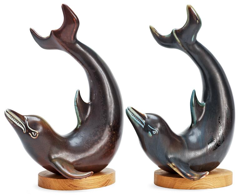 Two Gunnar Nylund stoneware figures of dolphins, Rörstrand.