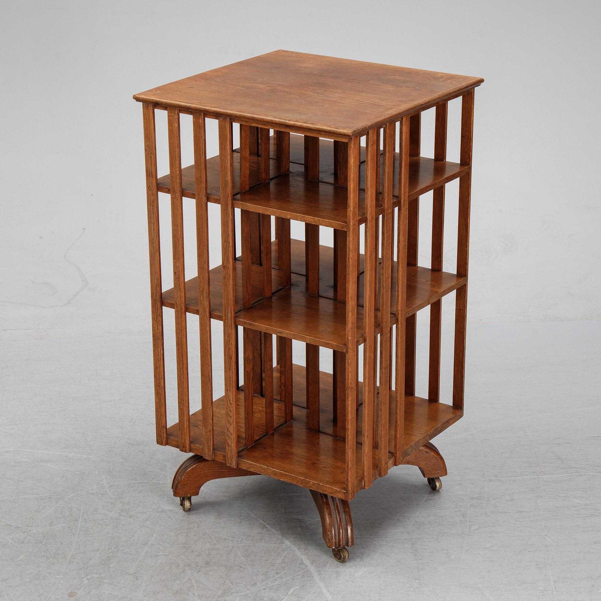 An oak revolving book case, early 20th Century.