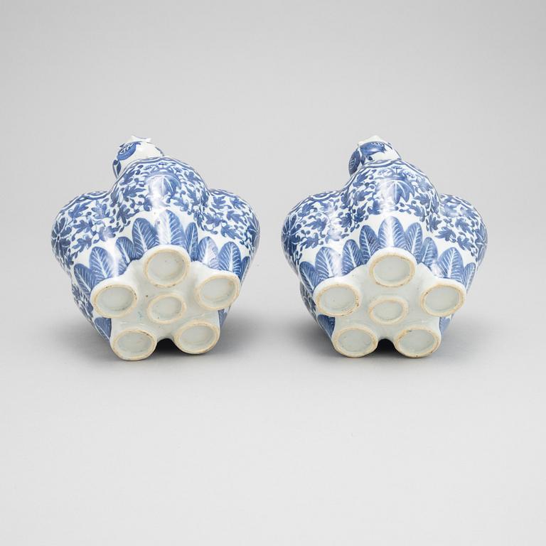 A pair of blue and white tulipvases, Qing dynasty, 19th Century.