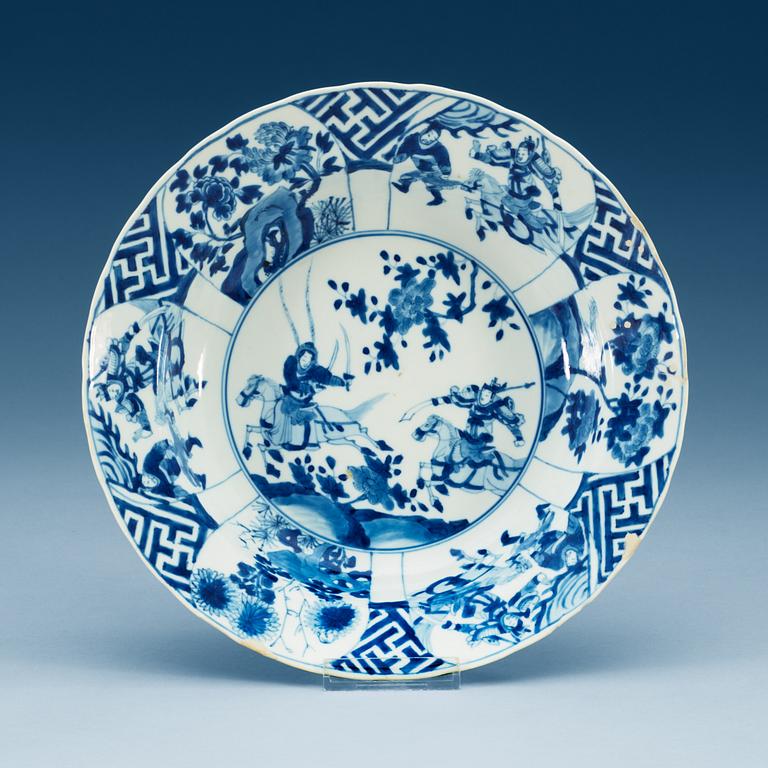 A blue and white klappmutz bowl, Qing dynasty, with Kangxi six character mark and of the period (1662-1722).
