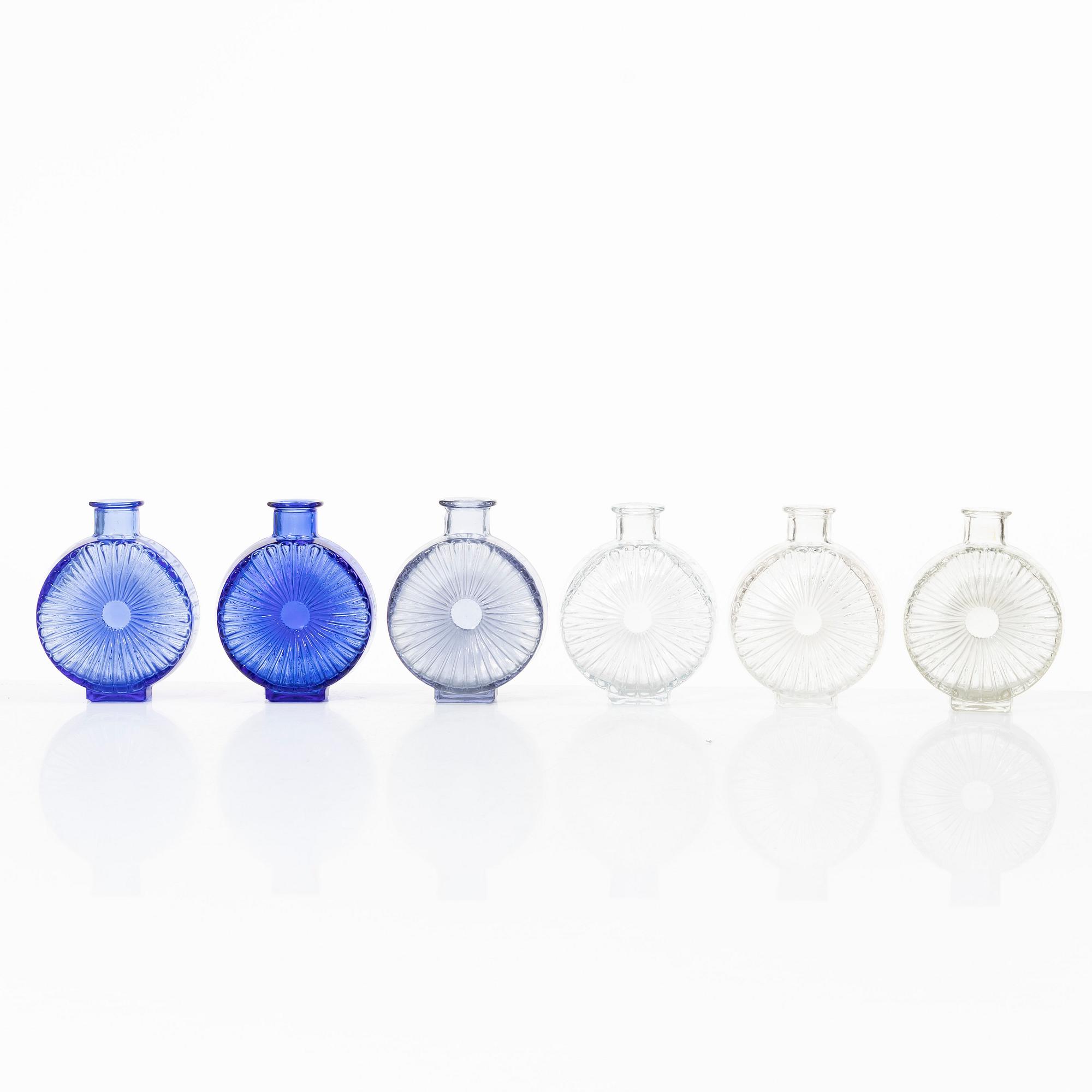 Helena Tynell, six 'Sun bottle' glass flasks, Riihimäen Lasi Oy. Manufactured between 1964-74.