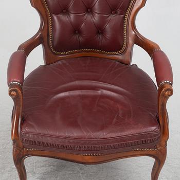 A Rococo style armchair, second half of the 20th century.