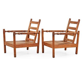 503. A pair of Axel Einar Hjorth stained pine 'Sandhamn' armchairs, Nordiska Kompaniet Sweden 1932.