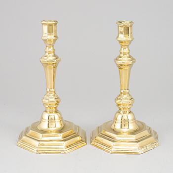 A pair of French bronze candlesticks.