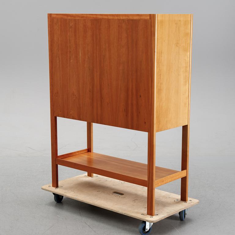 A model 2135 cabinet by Josef Frank for Firma Svenskt Tenn.