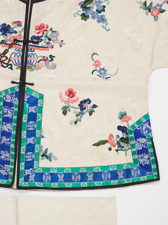 An ebroidered silk jacket and coat, China, first half of the 20th Century.