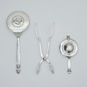 Georg Jensen, a sterling silver serving spade, a sandwich tong and a tea strainer, 3 pcs, Copenhagen after 1945 and one 1925-1932.