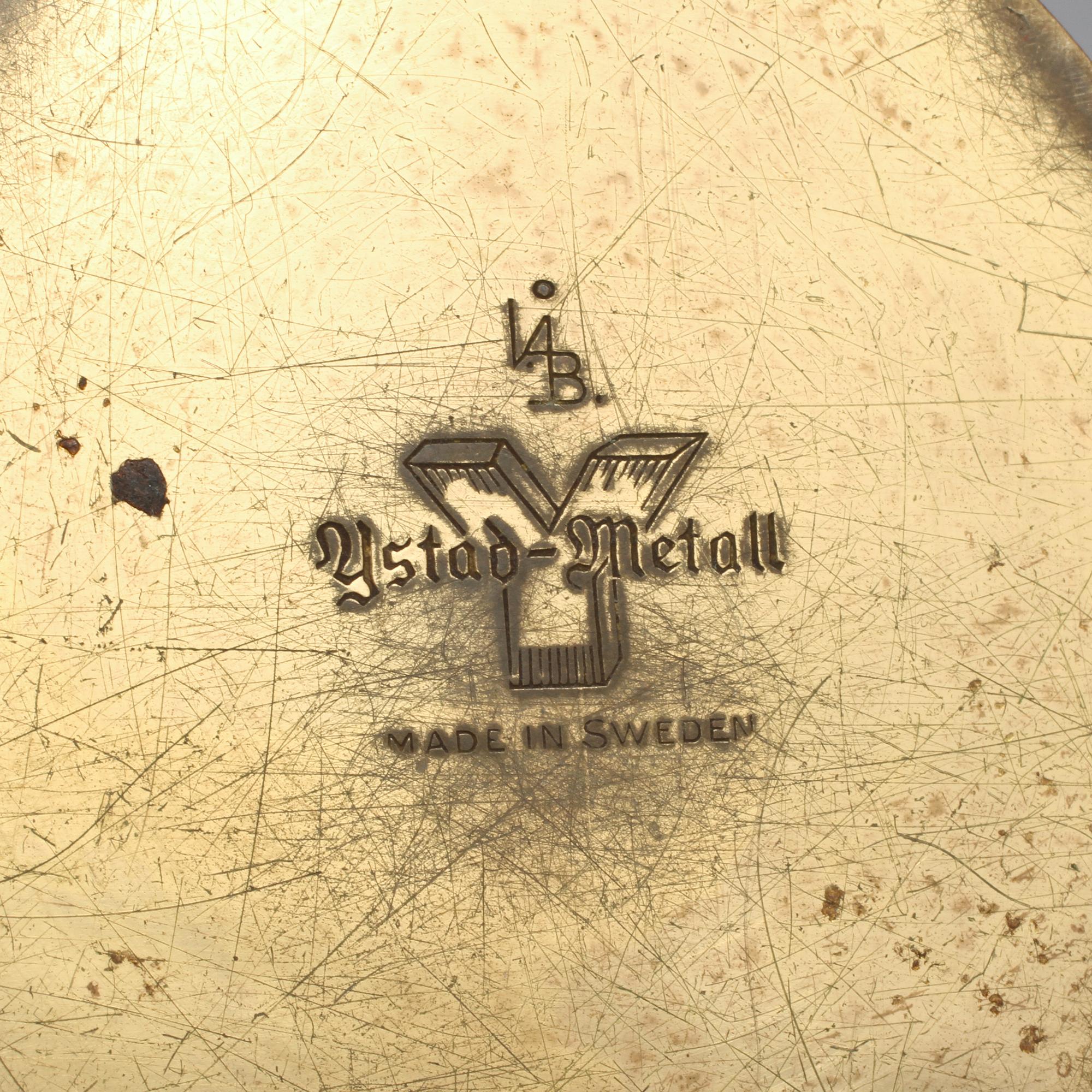 LJUSSTAKAR, ett par, mässing, "Liljan", Ivar Ålenius Björk, Ystad metall, 1900-tal.