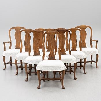 Dining table, 8 chairs, 2 armchairs, sideboard, Rococo style, early 20th century.