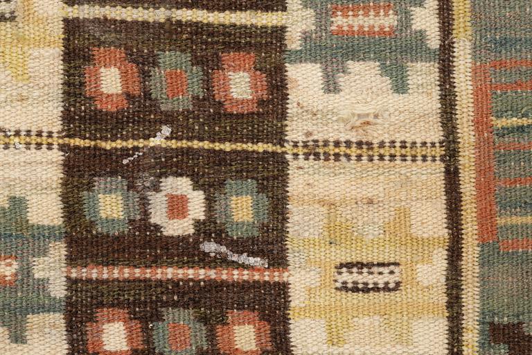 Märta Måås-Fjetterström, a textile, 'Rabatten', flat weave, ca 100 x 50 cm, signed MMF.