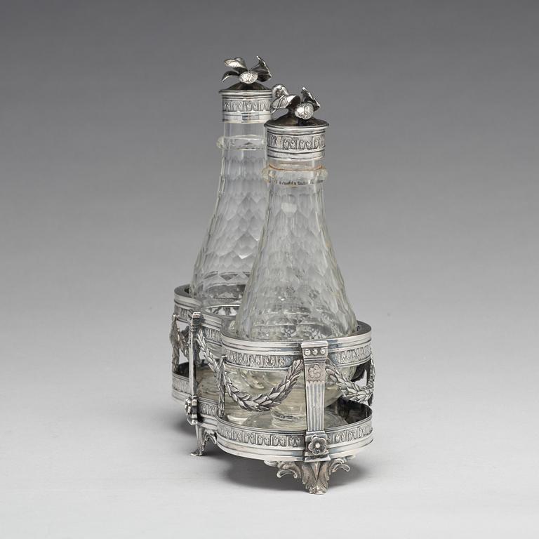 A Swedish 18th century silver and glass cruet-set, mark of Petter Eneroth, Stockholm 1780.