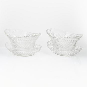 A pair of cut glas jardiieres on stands, 19th Century.