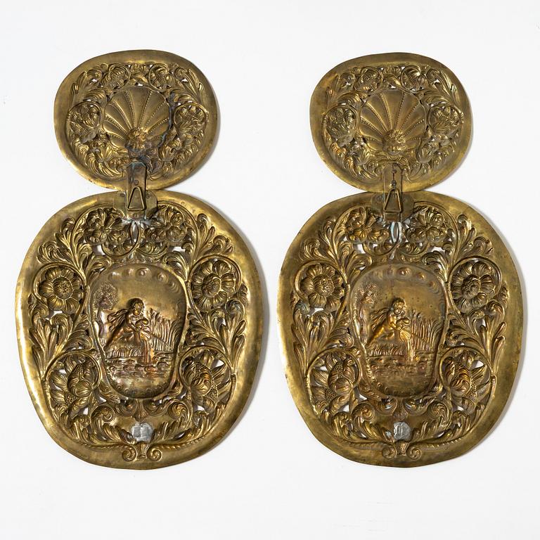 A pair of  Swedish Baroque style brass light plates, Johan F Hellström, Nyköping around the year 1900.