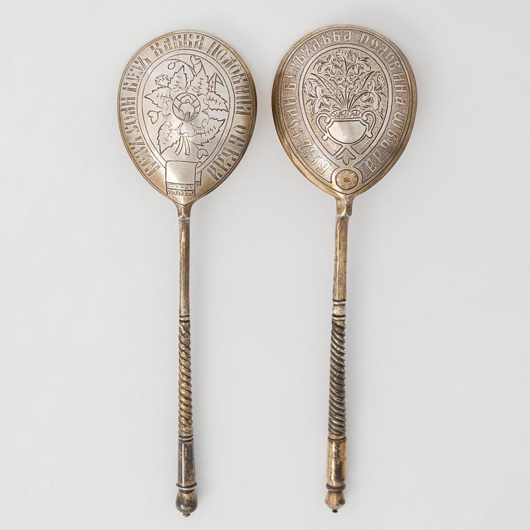 Two 19th-century parcel-gilt silver spoons, Moscow 1877-98.