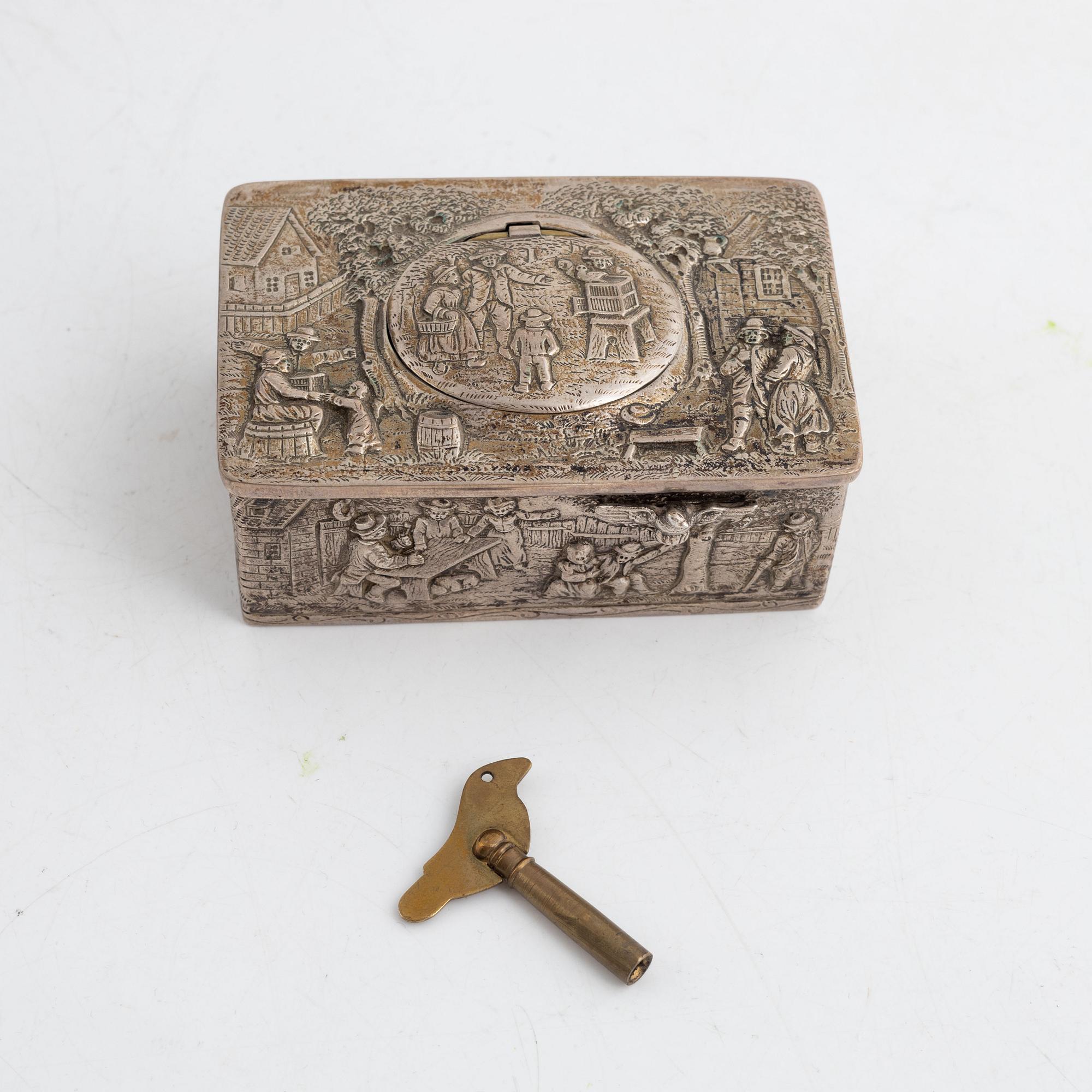 A German rococo style silver-plate music box, 19th century.