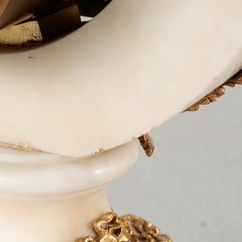 A table clock, dial marked "Gilles l'Ainé Paris", made around year 1900.
