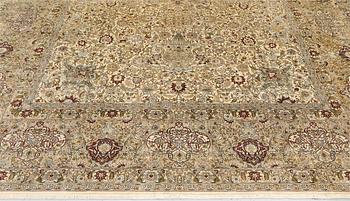 A oriental silk carpet, 350 x 247 cm.
