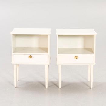 A pair of painted 1950s bedside tables.