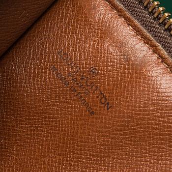 A "Pochette Documents" by  LOUIS VUITTON.