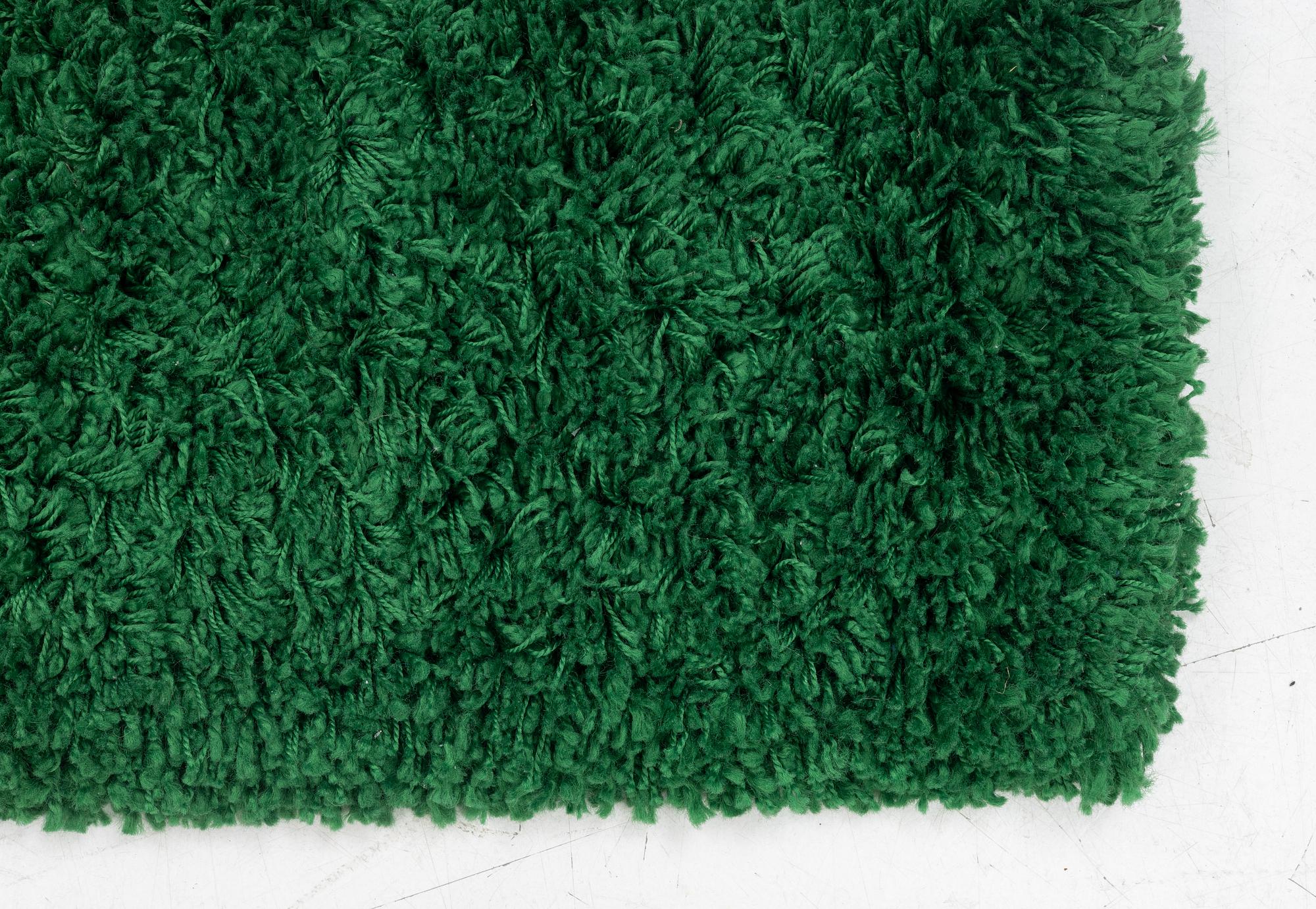 a "Wet Grass" carpet, Ikea, ca 199 x 136 cm.