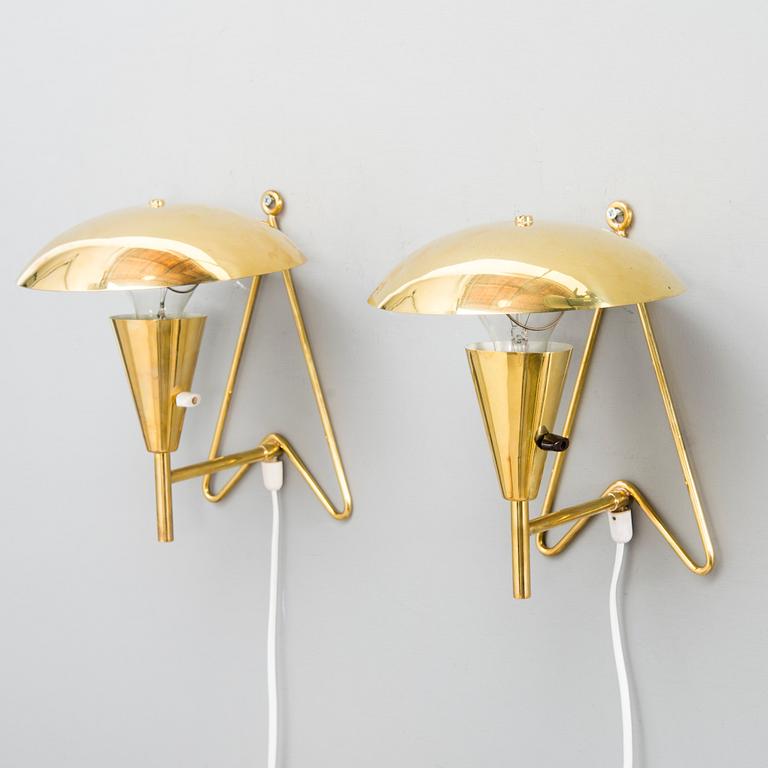 A pair of mid-20th-century wall lights / table lamps, model EV 57 for Itsu, Finland.