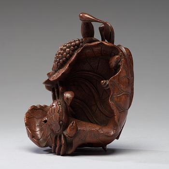 A bamboo carving of a crab and lotus, late Qing dynasty.